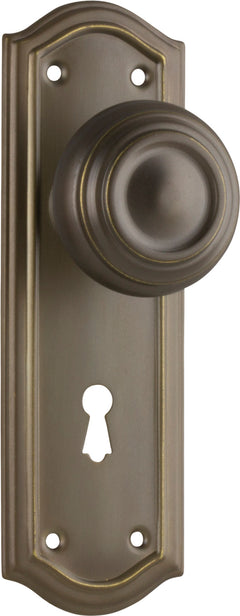 Kensington Door Knob - Long Backplate Antique Brass / Lock | Lock (Skeleton Key)